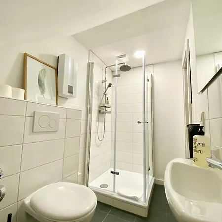 The Suites City Lofts At The Park Hamburg Room photo